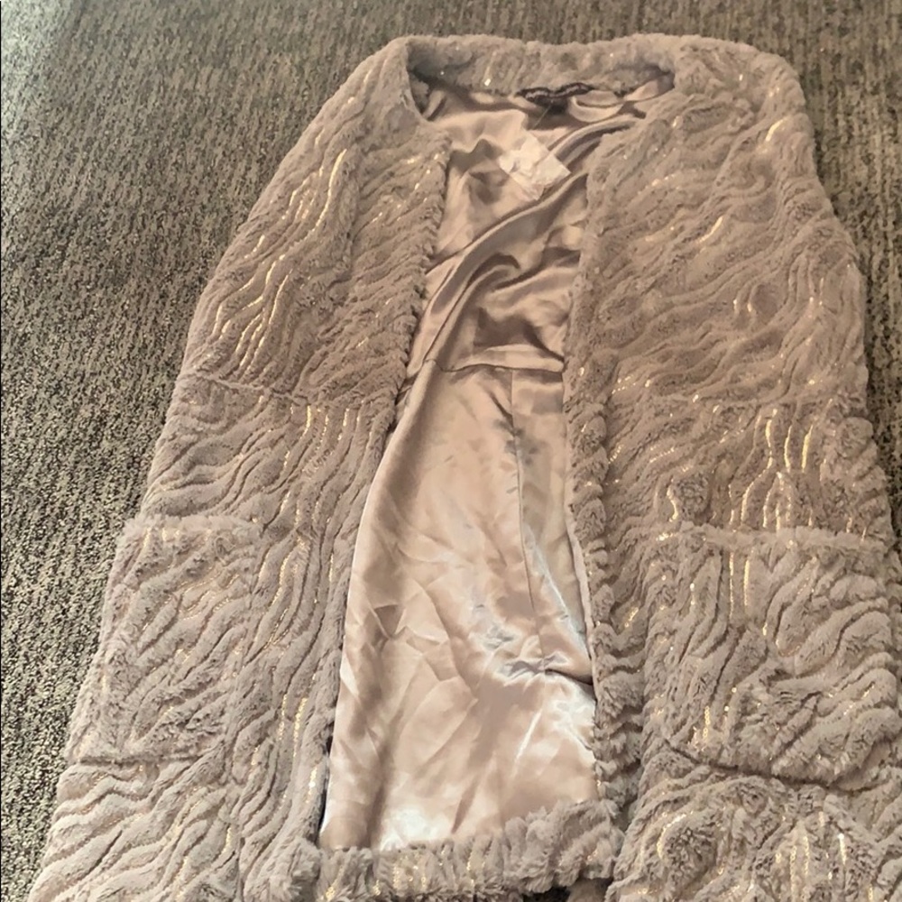 Grey fur vest with sequence accents size L